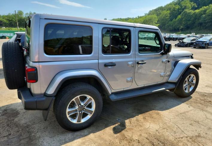 Salvage 2021 Jeep Wrangler Unlimited Sahara in Серебристый