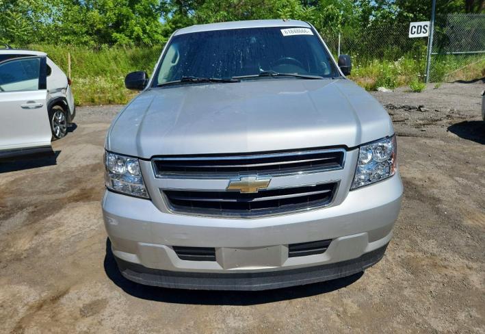 Salvage 2011 Chevrolet Tahoe Hybrid in Gray
