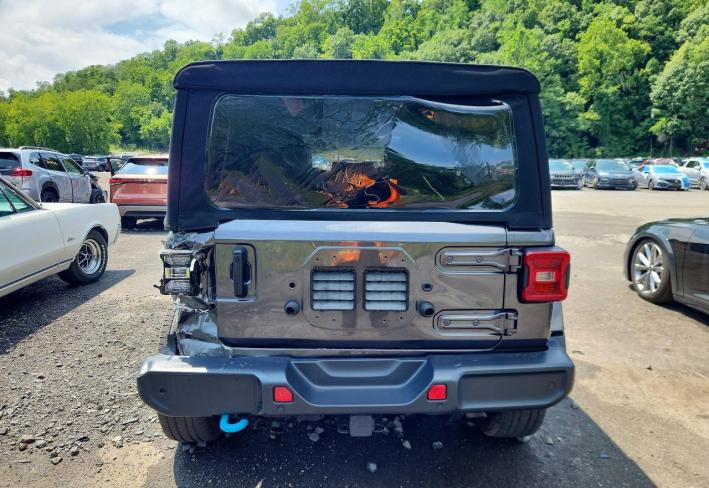 Salvage 2024 Jeep Wrangler Sahara 4xe in Black
