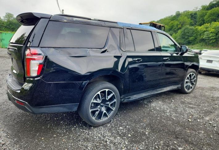 Salvage 2023 Chevrolet Suburban Rst in Черный