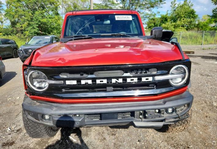 Salvage 2023 Ford Bronco Wildtrak in Burgundy