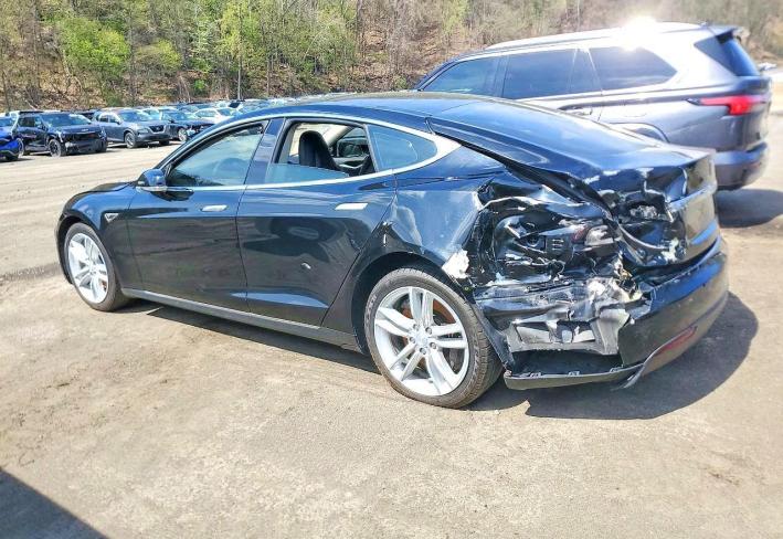 Salvage 2015 Tesla Model S  in Black