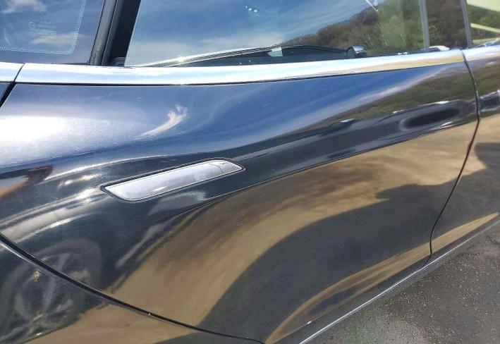 Salvage 2015 Tesla Model S  in Black
