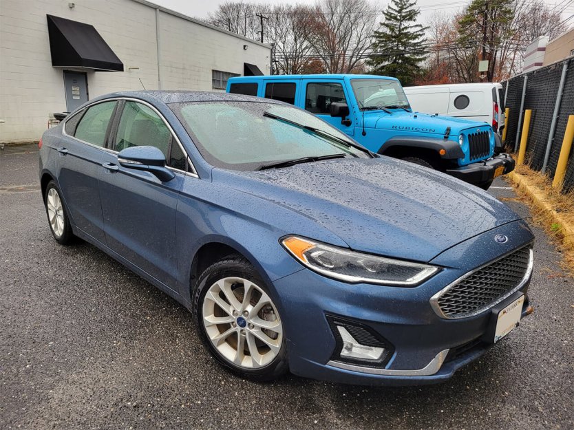 Salvage 2019 Ford Fusion Titanium Hybrid