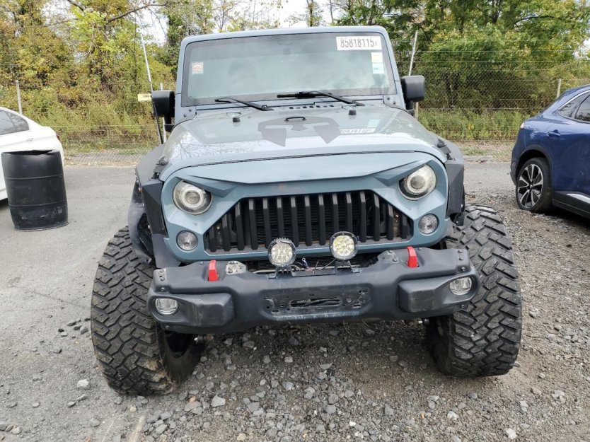 Salvage 2015 Jeep Wrangler Unlimited Sport