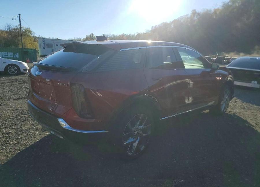 Salvage 2025 Cadillac Optiq Luxury in Burgundy