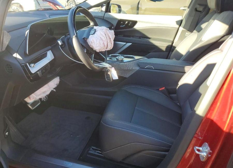 Salvage 2025 Cadillac Optiq Luxury in Burgundy