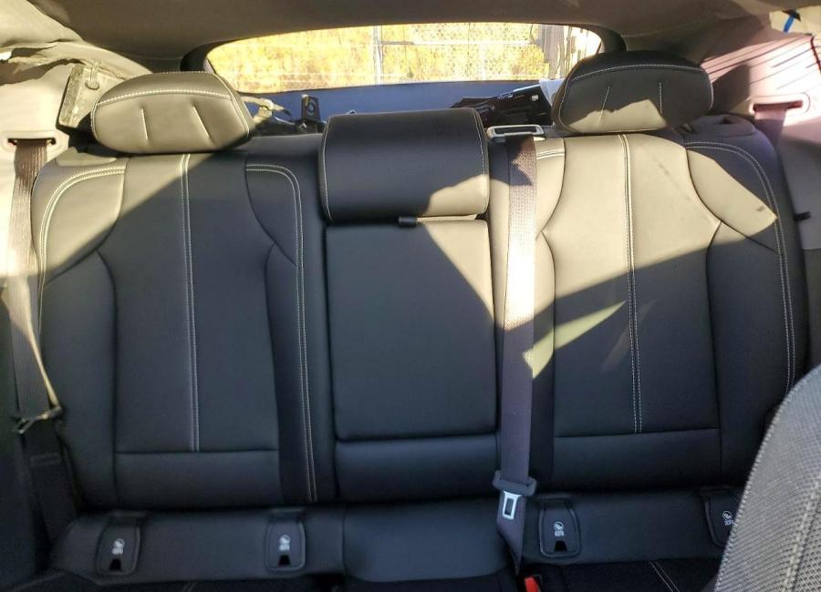 Salvage 2025 Cadillac Optiq Luxury in Burgundy