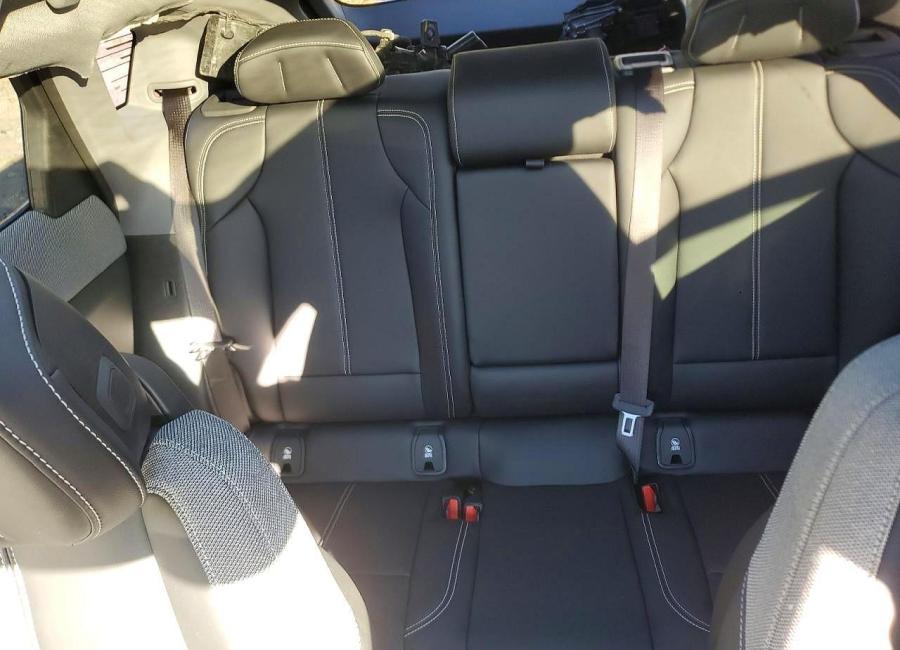 Salvage 2025 Cadillac Optiq Luxury in Burgundy