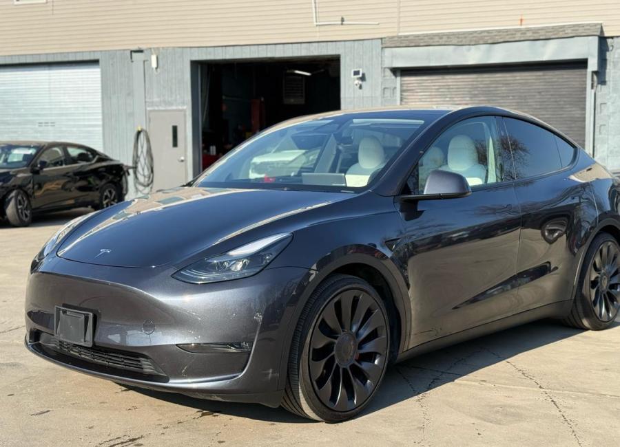 Salvage 2025 Tesla Model Y  in Gray