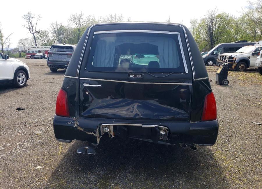 Salvage 2003 Cadillac Commercial Hearse in Black