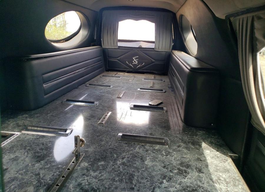 Salvage 2003 Cadillac Commercial Hearse in Black