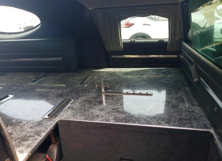 Salvage 2003 Cadillac Commercial Hearse in Black