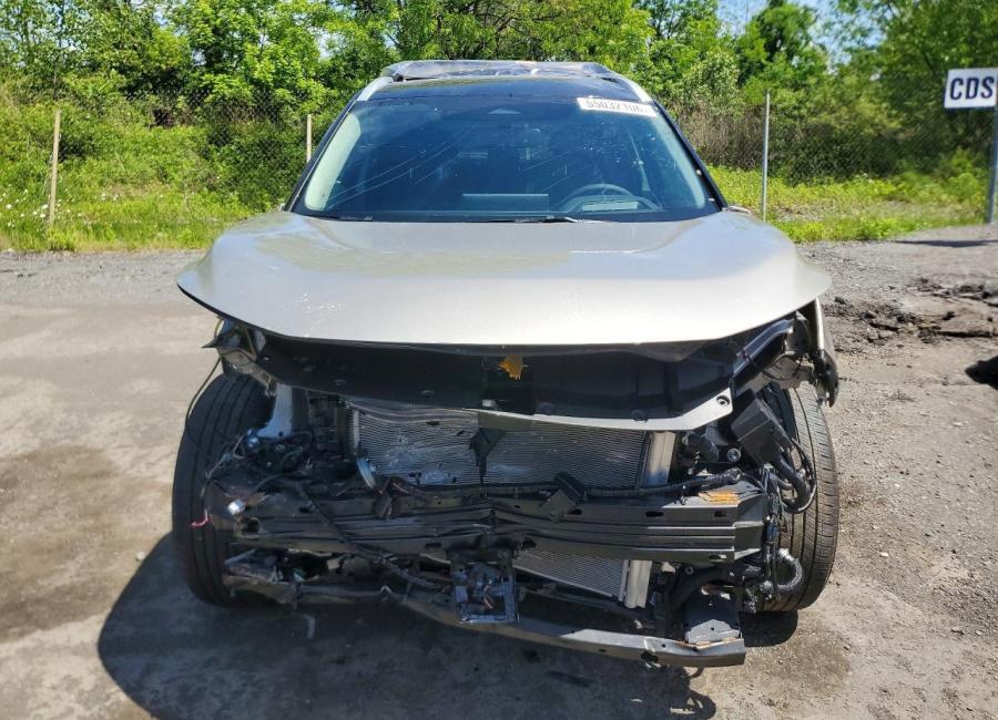 Salvage 2025 Nissan Rogue Platinum in Gold