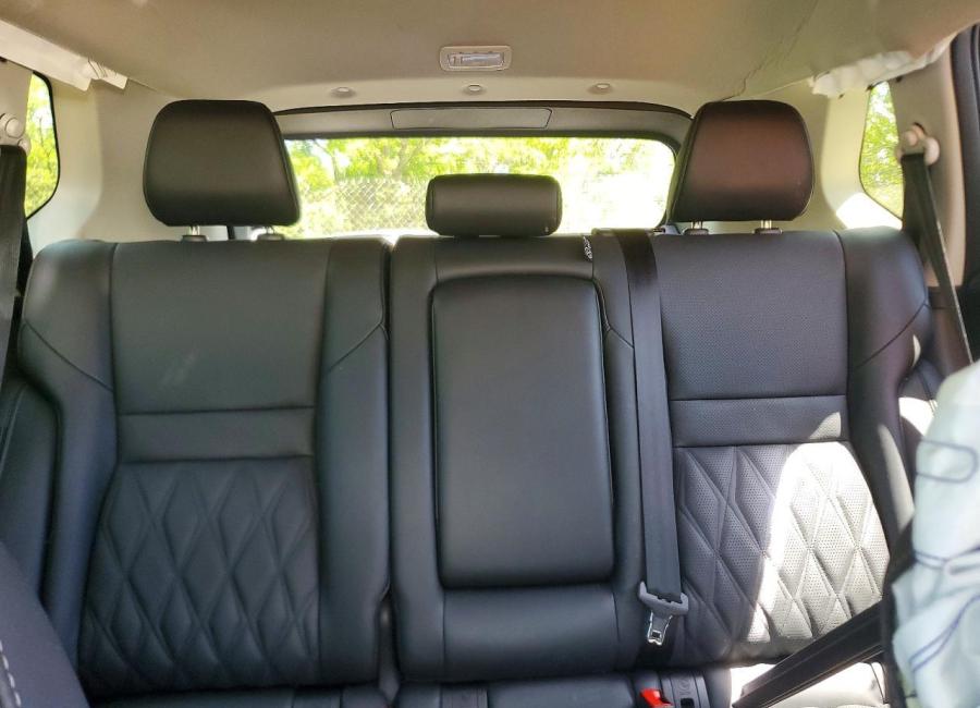 Salvage 2025 Nissan Rogue Platinum in Gold