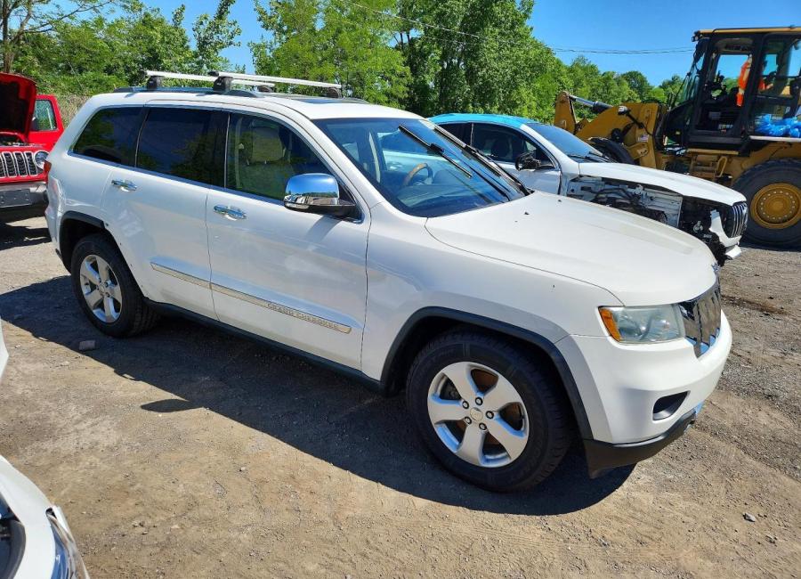 Salvage 2011 Jeep Grand Cherokee Overland in White