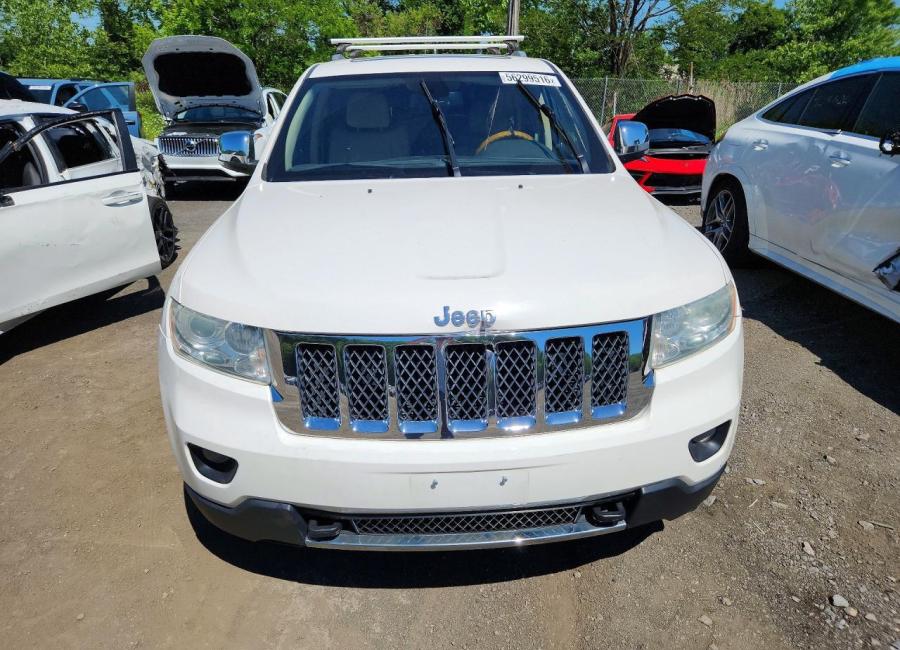 Salvage 2011 Jeep Grand Cherokee Overland in White