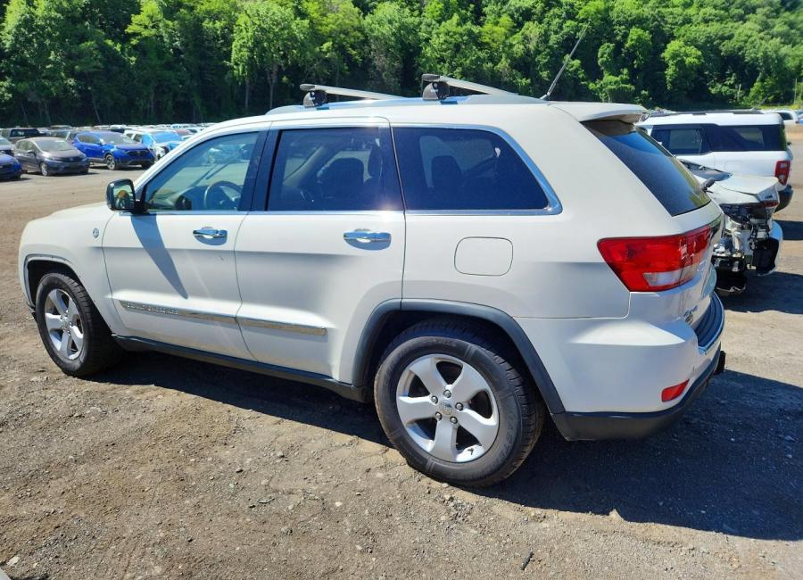 Salvage 2011 Jeep Grand Cherokee Overland in White