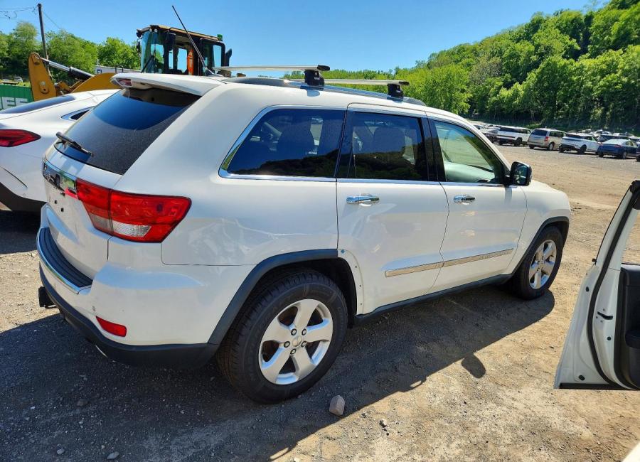 Salvage 2011 Jeep Grand Cherokee Overland in White
