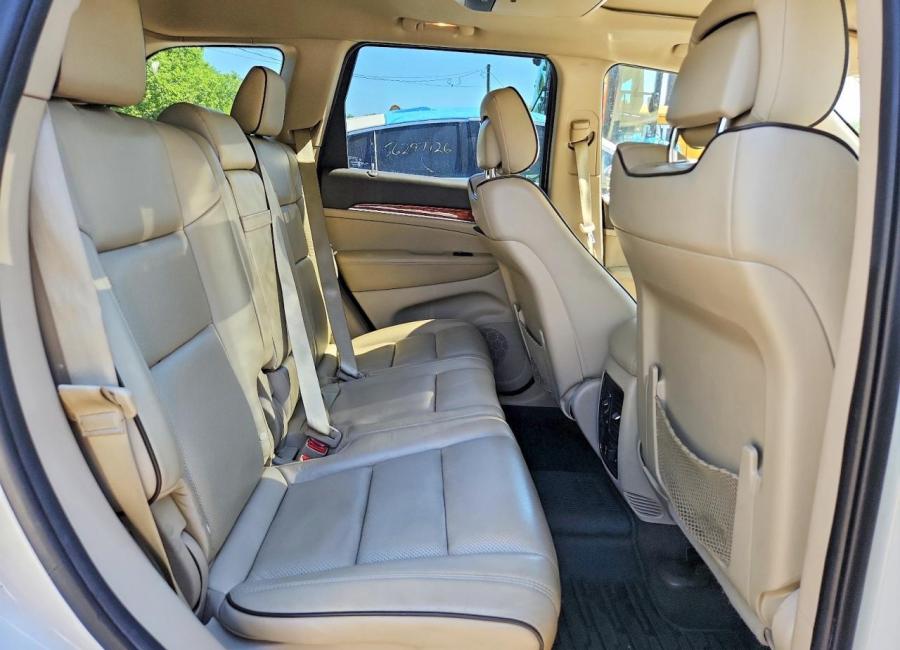 Salvage 2011 Jeep Grand Cherokee Overland in White