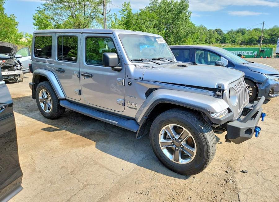 Salvage 2021 Jeep Wrangler Unlimited Sahara in Silver