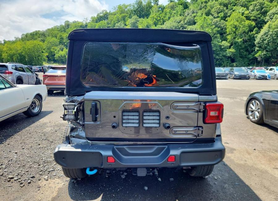 Salvage 2024 Jeep Wrangler Sahara 4xe in Black