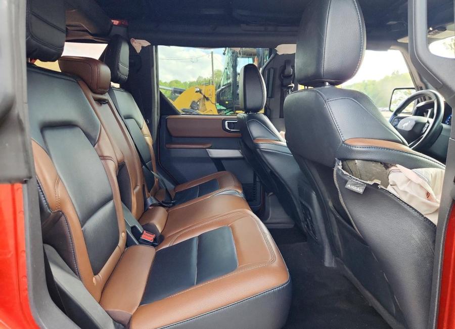 Salvage 2023 Ford Bronco Wildtrak in Burgundy
