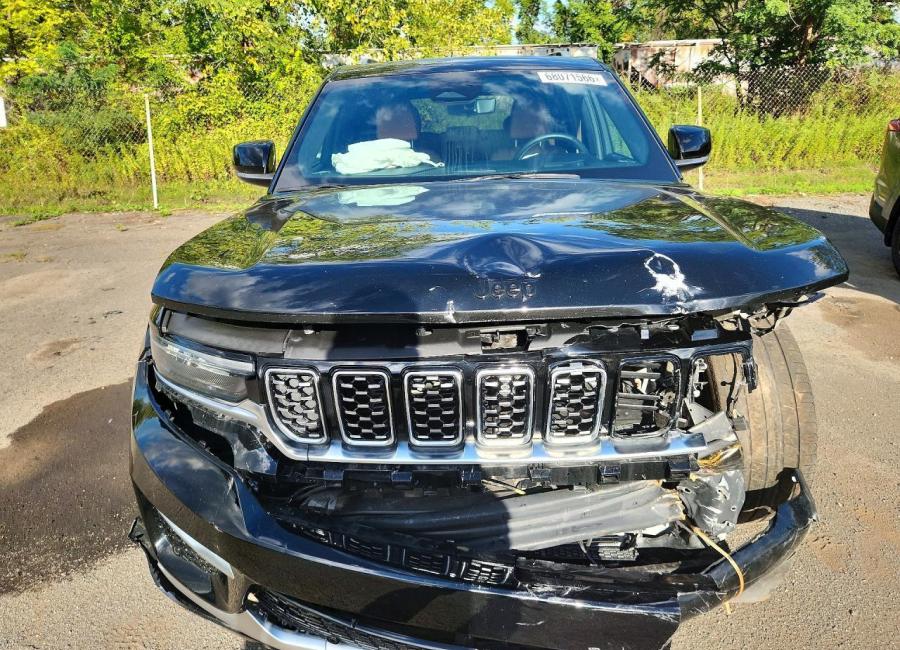 Salvage 2023 Jeep Grand Cherokee Summit 4xe in Black
