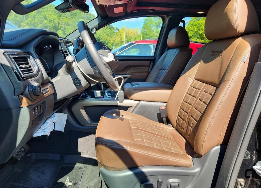 Salvage 2024 Nissan Titan Platinum Reserve in Black