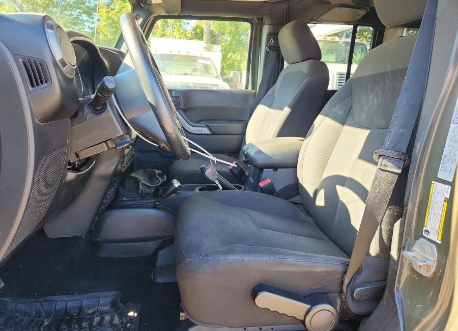 Salvage 2016 Jeep Wrangler Unlimited Sport in Green