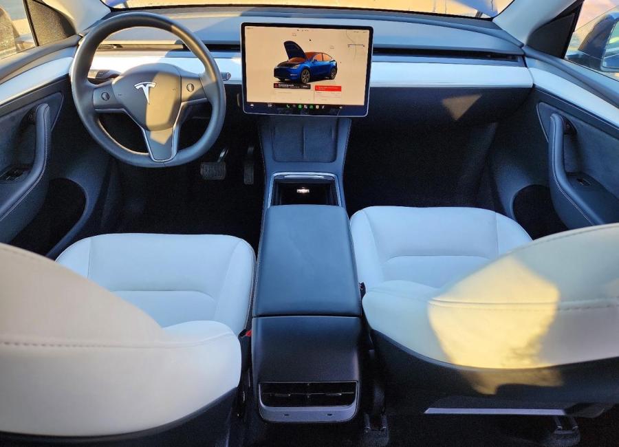 Salvage 2025 Tesla Model Y  in Blue