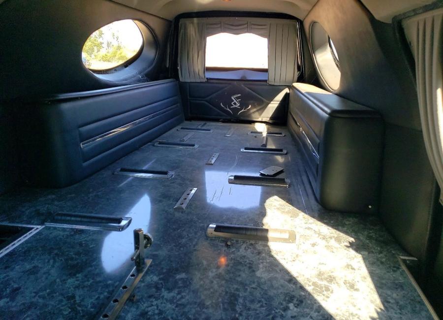 Salvage 2003 Cadillac Commercial Hearse in Black