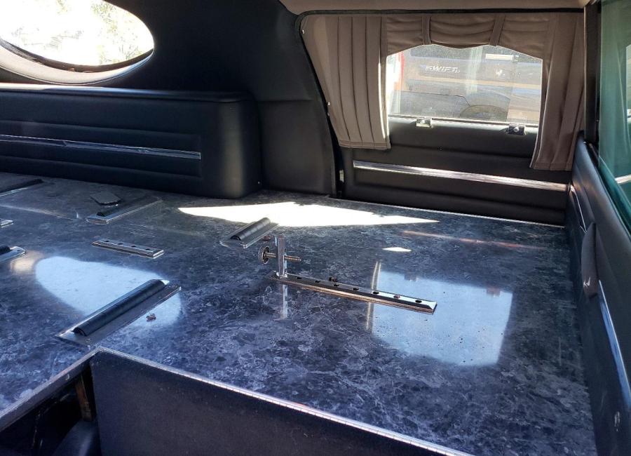 Salvage 2003 Cadillac Commercial Hearse in Black