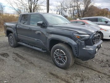 2024 toyota tacoma TRD в Black - Вид с передней части под углом - Инвентарь BidGoDrive