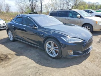 2015 tesla model-s  in Black - Front Three-Quarter View - BidGoDrive Inventory